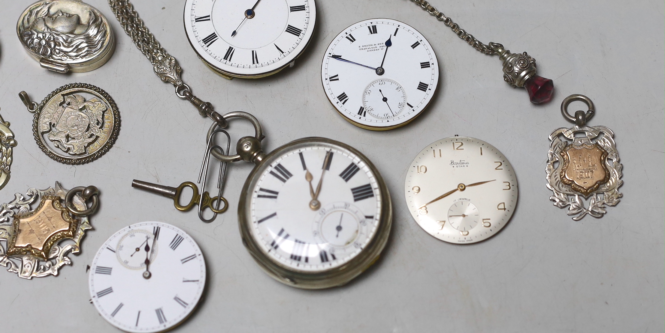 A late Victorian silver open faced pocket watch by J. Williams of Carmarthen, together with other watch movements, pill box, medallions etc.